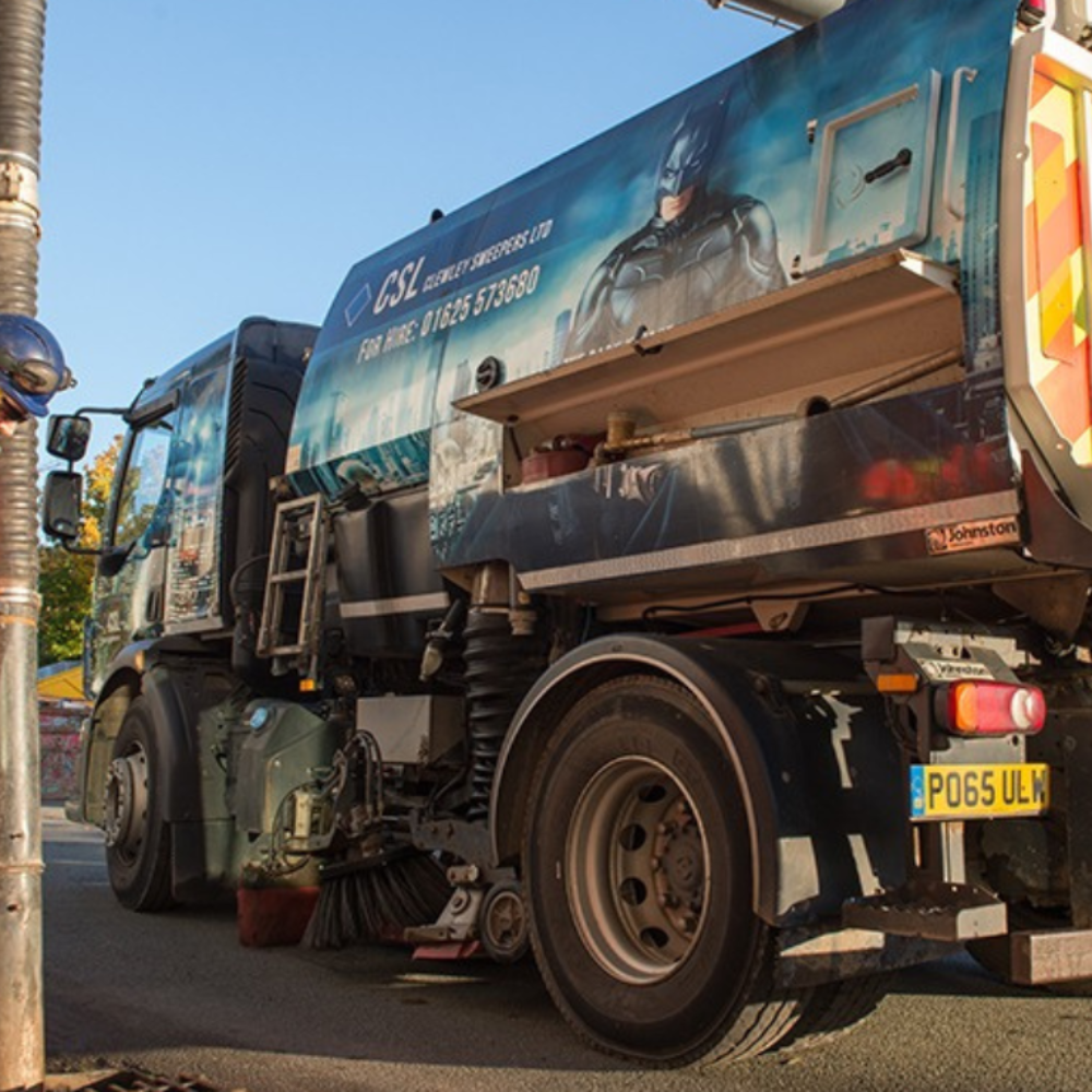 Road sweeping vehicle representing minimal disruption